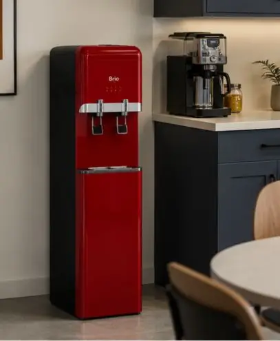 Red upright water cooler in a office kitchen